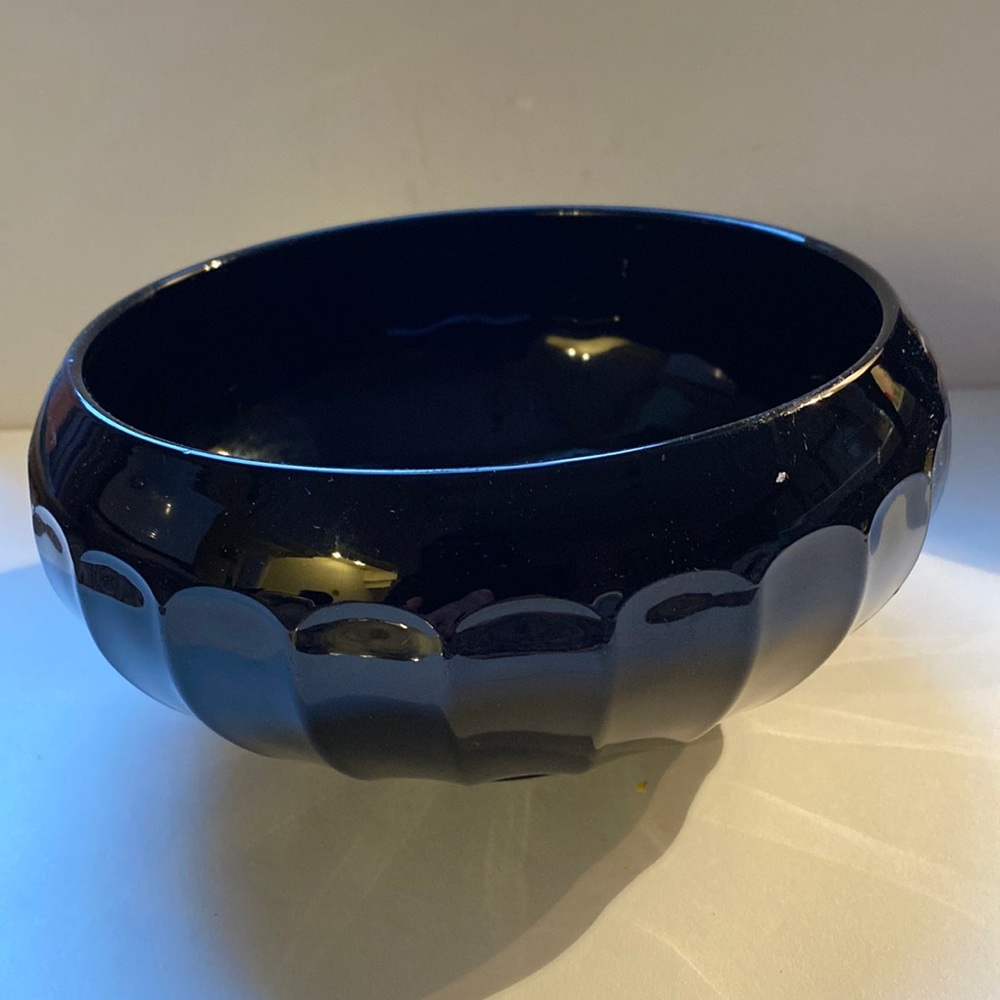 Black glass depression glass ribbed bowl